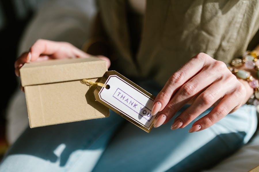 a woman holding a present 
