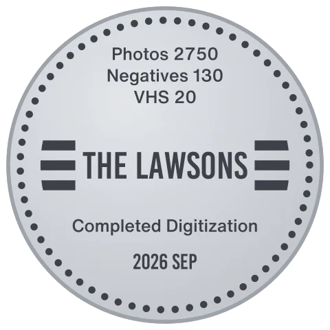 Silver Vault lid laser-engraved in the Classic style with the name The Lawsons, photo, negative and VHS counts and the completion date